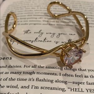 Gold bangle bracelet with accent diamond